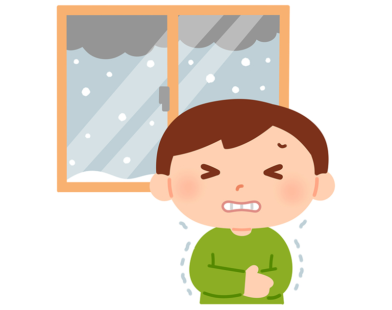 暖房が止まってしまい寒さに耐える男性